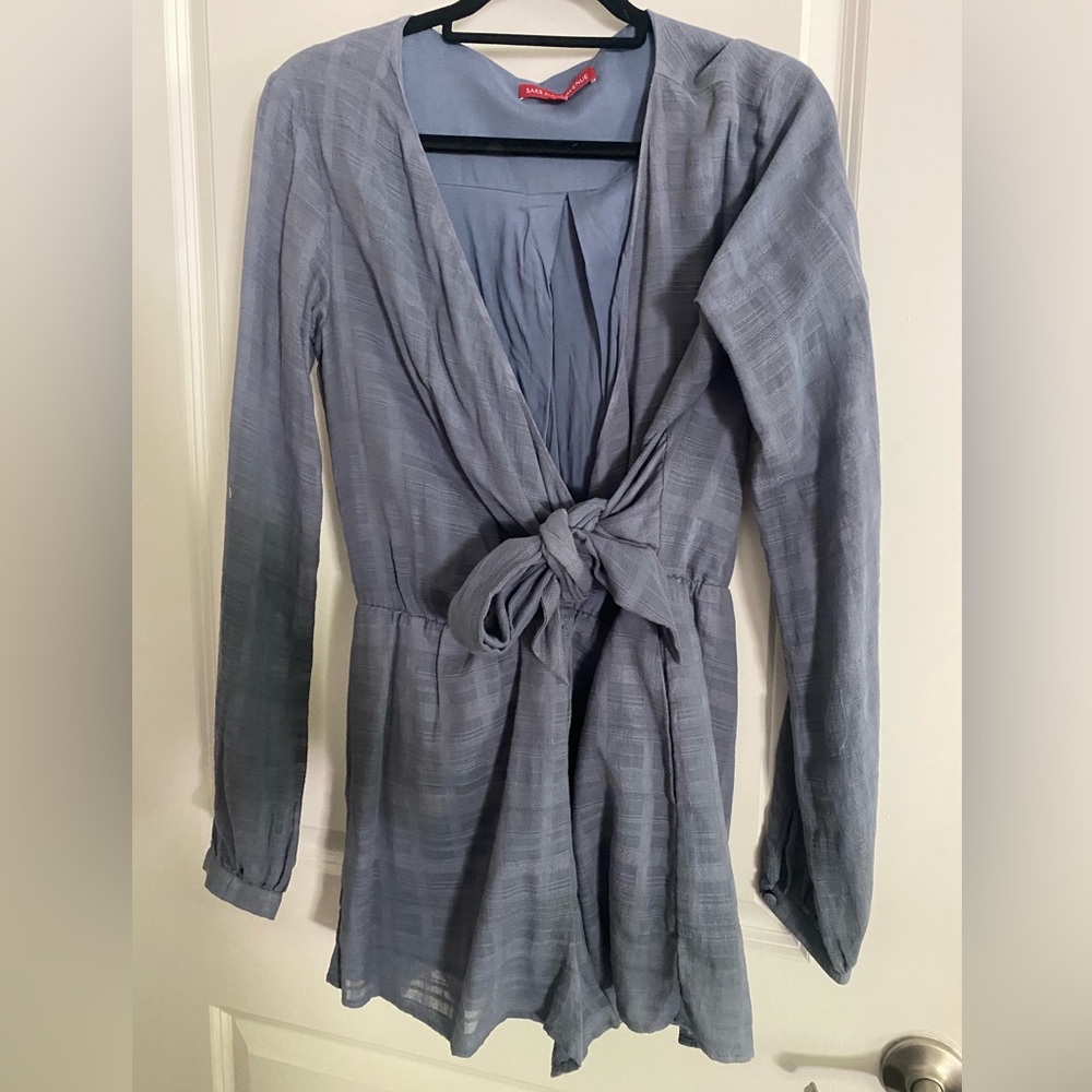Romper! Worn once. Size. Ties in front